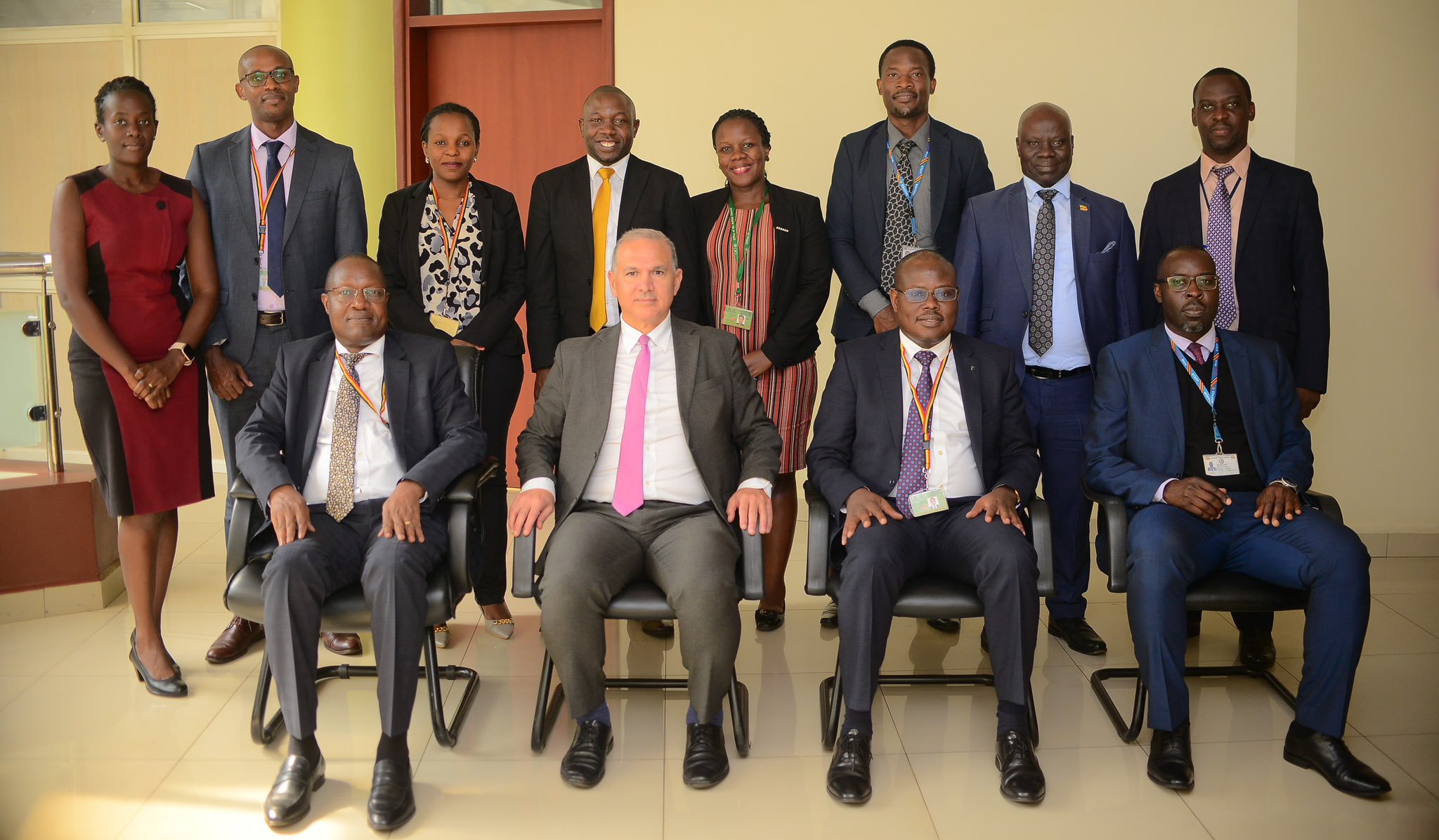 You are currently viewing Mr. Francisco Paris, the EITI International Secretariat validation team leader sits second from the left with OAG and UGEITI representatives December 6, 2023